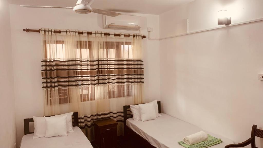 Postel nebo postele na pokoji v ubytování Elysian home villa