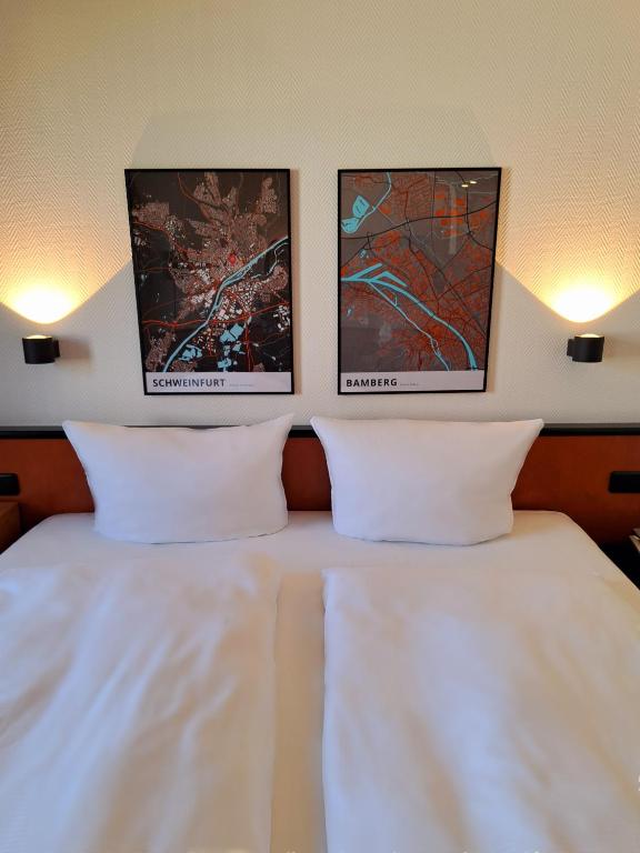 Postel nebo postele na pokoji v ubytování Hotel Ross