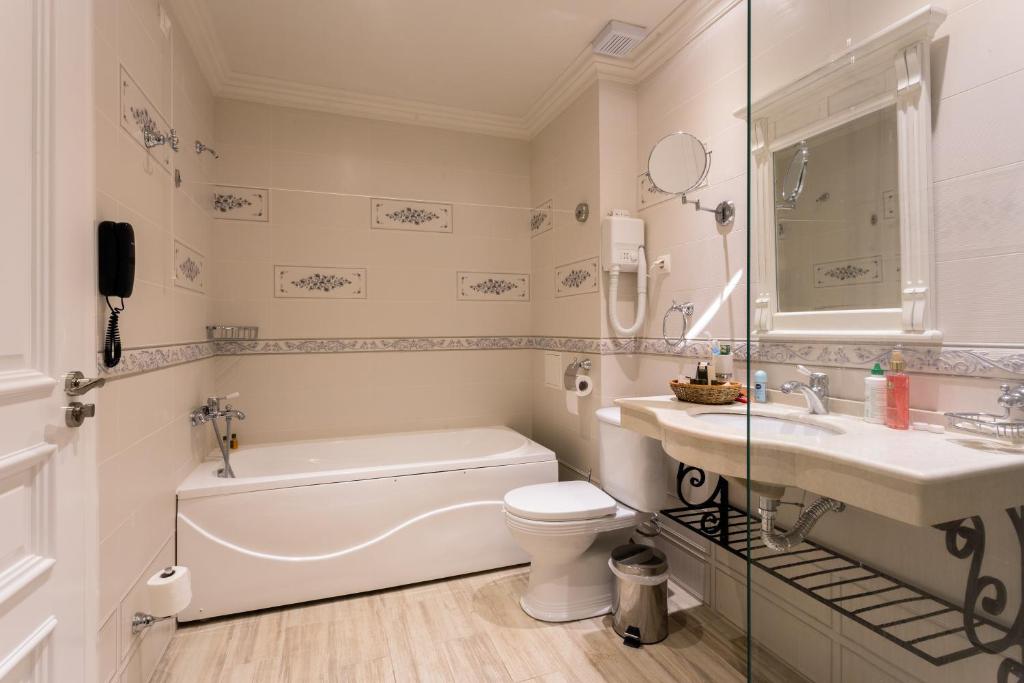A bathroom at Therma Palace - All inclusive & Private Beach & Free Parking