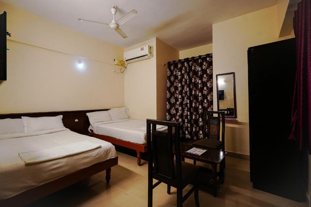 Postel nebo postele na pokoji v ubytování Hotel Golden Rooms