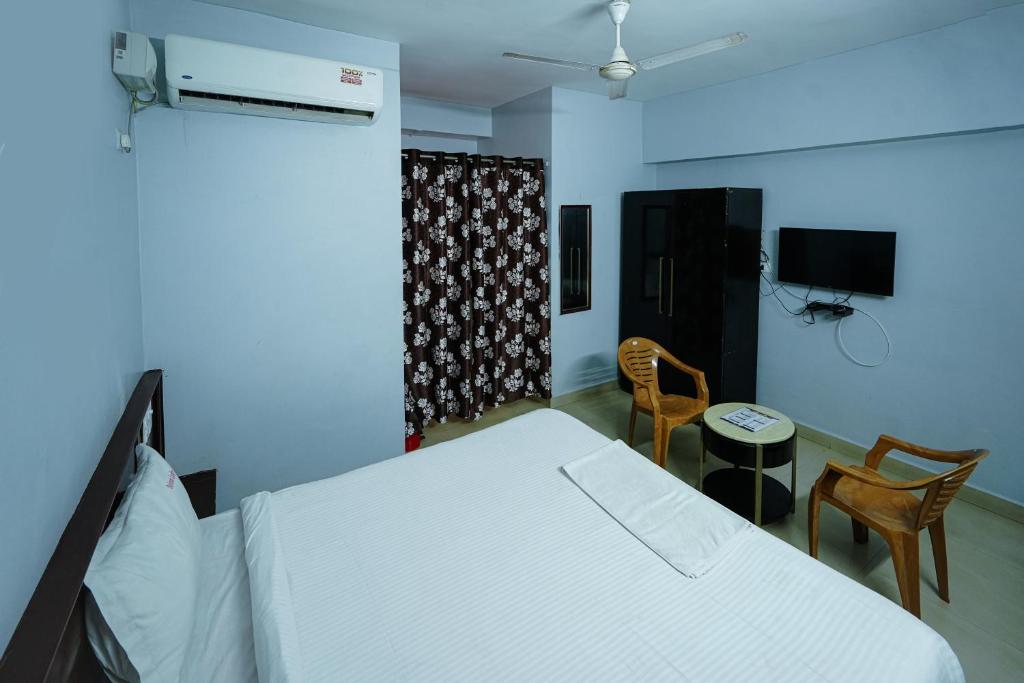 Postel nebo postele na pokoji v ubytování Hotel Golden Rooms