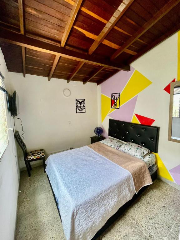 Postel nebo postele na pokoji v ubytování Hostel Urban City Medellin