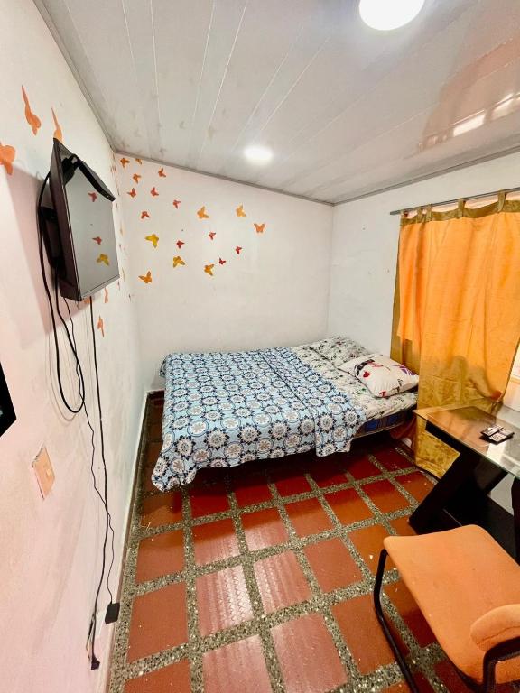 Postel nebo postele na pokoji v ubytování Hostel Urban City Medellin