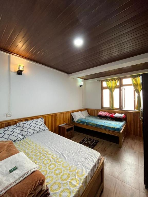 Postel nebo postele na pokoji v ubytování Hangkhim Homestay