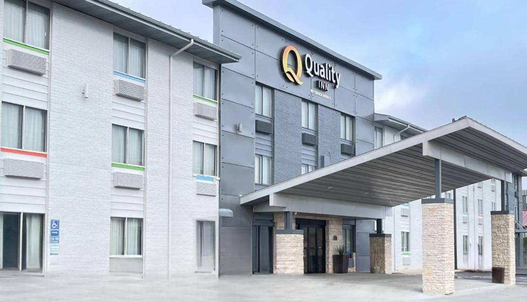 a hotel with a sign on the front of it at Quality Inn - Denton in Denton