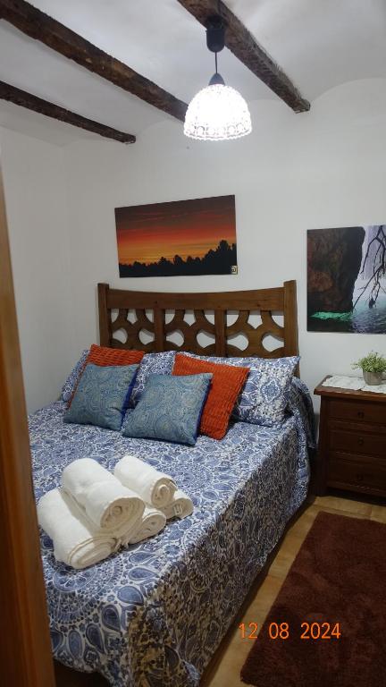 Postel nebo postele na pokoji v ubytování El Nido de Casa Nieves
