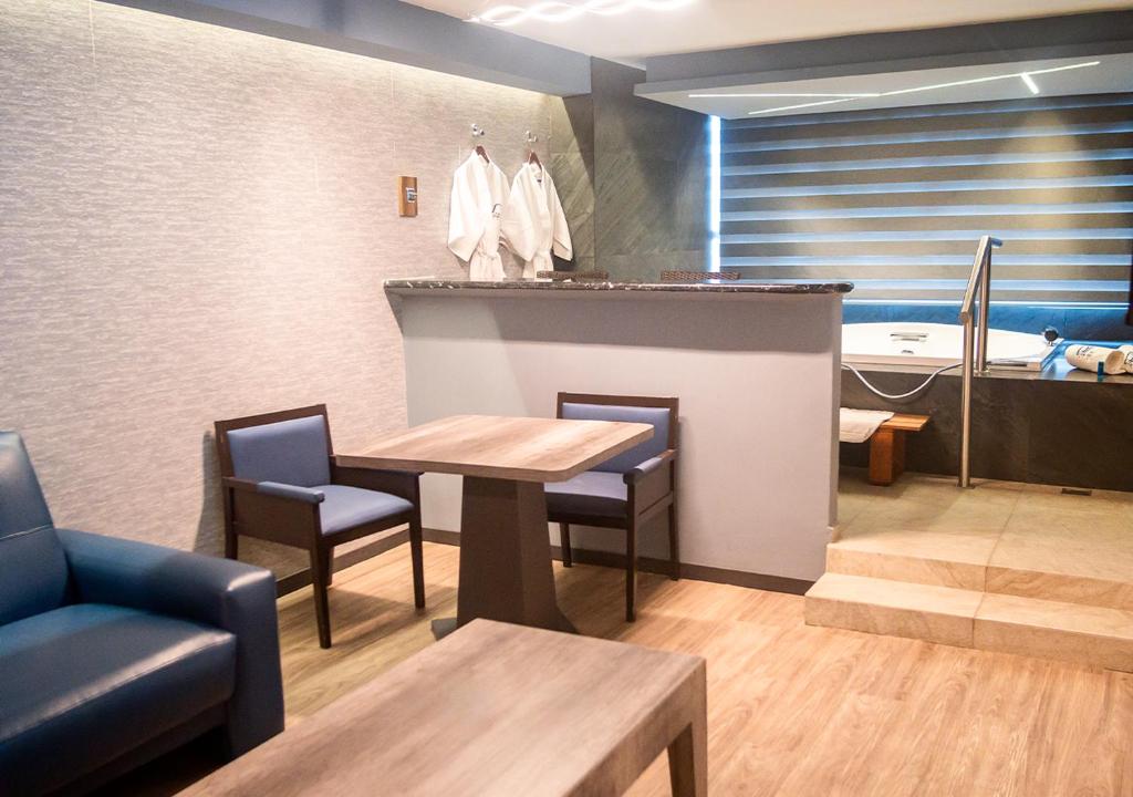 Posezení v ubytování Hotel Parque Satelite