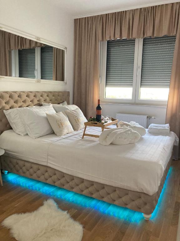 Postel nebo postele na pokoji v ubytování Apartman 10 Lux