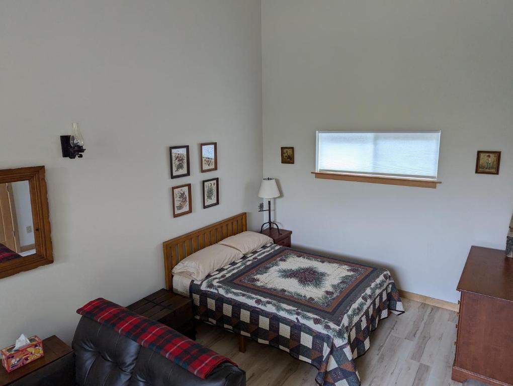 Postel nebo postele na pokoji v ubytování Gnome Home