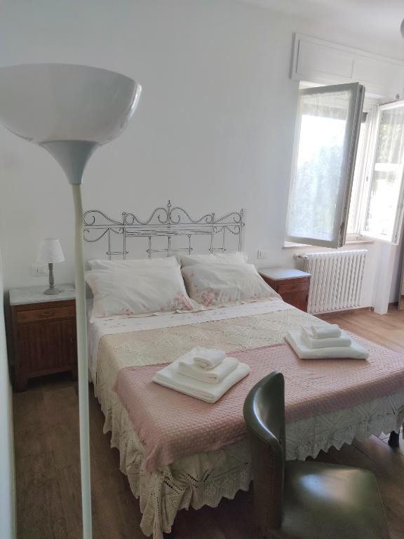 Postel nebo postele na pokoji v ubytování Tiny Room