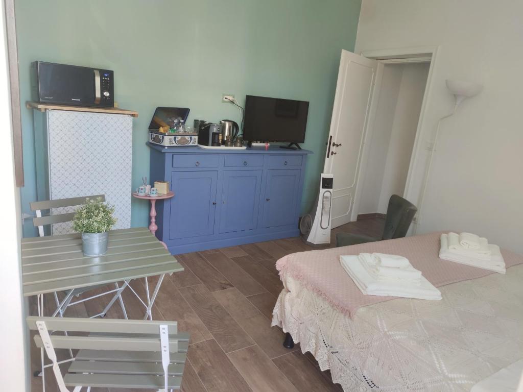 Kuchyň nebo kuchyňský kout v ubytování Tiny Room