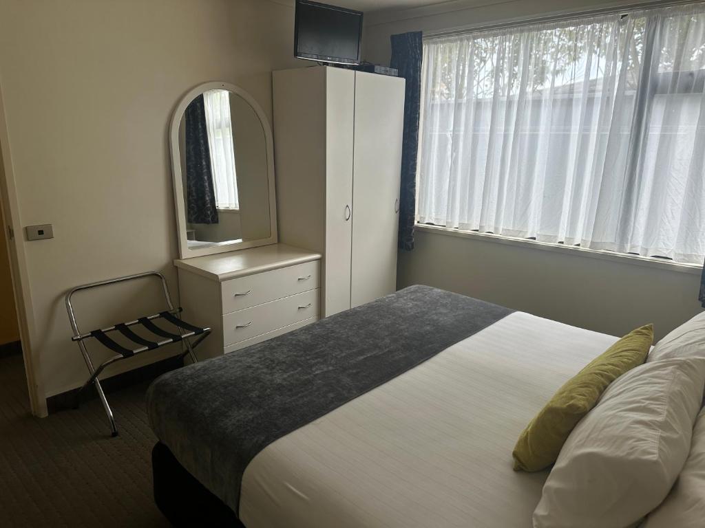 Postel nebo postele na pokoji v ubytování Ballina Motel