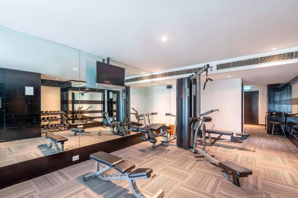 a gym with several treadmills and cardio machines at Svelte Delhi, a member of Radisson Individuals in New Delhi
