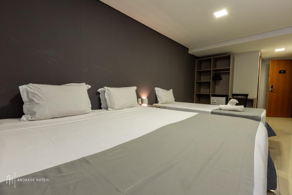 Cama ou camas em um quarto em Rede Andrade Solmar