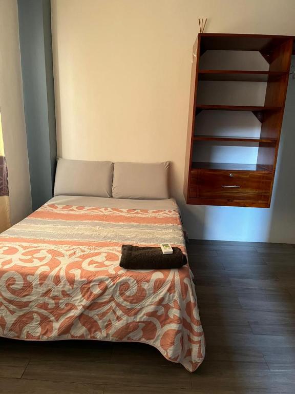 Postel nebo postele na pokoji v ubytování Casa Alexita