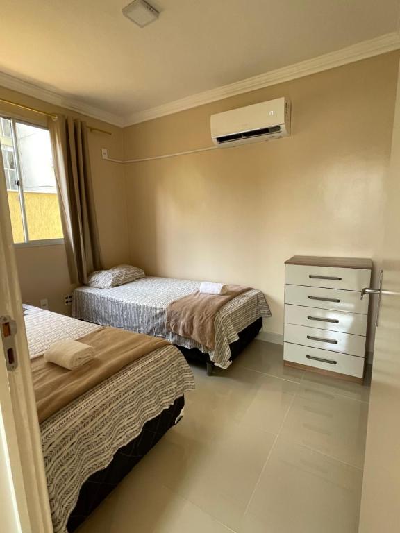 Postel nebo postele na pokoji v ubytování Apartamento Manaus Aeroporto