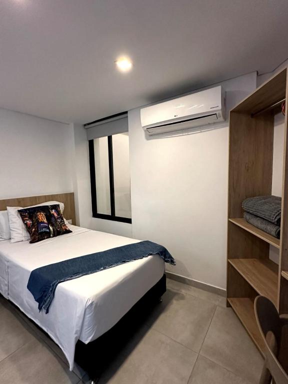 Postel nebo postele na pokoji v ubytování Hotel Zona Verde