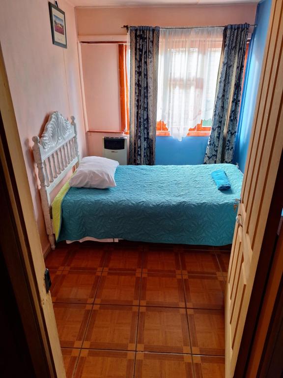 Postel nebo postele na pokoji v ubytování Natales trip