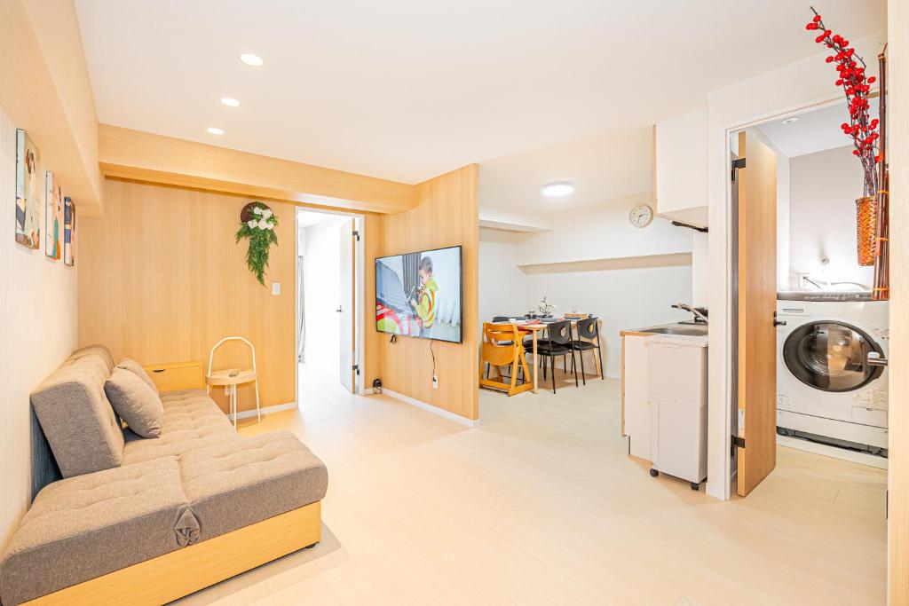 Kuchyň nebo kuchyňský kout v ubytování Sakura Suite 404