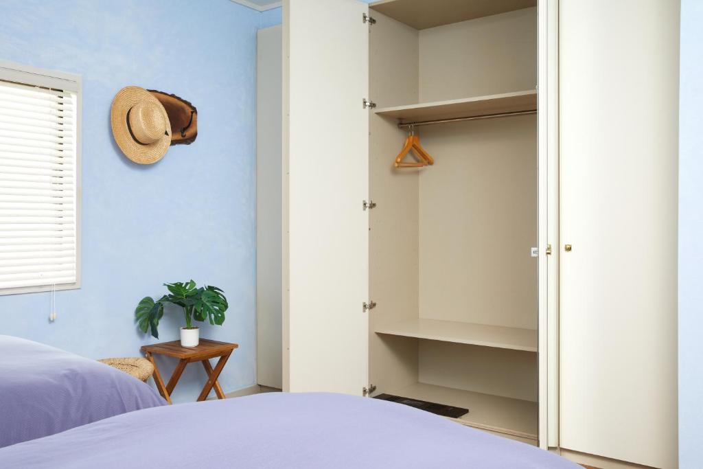 Postel nebo postele na pokoji v ubytování 一棟貸し別荘 mitt house inn