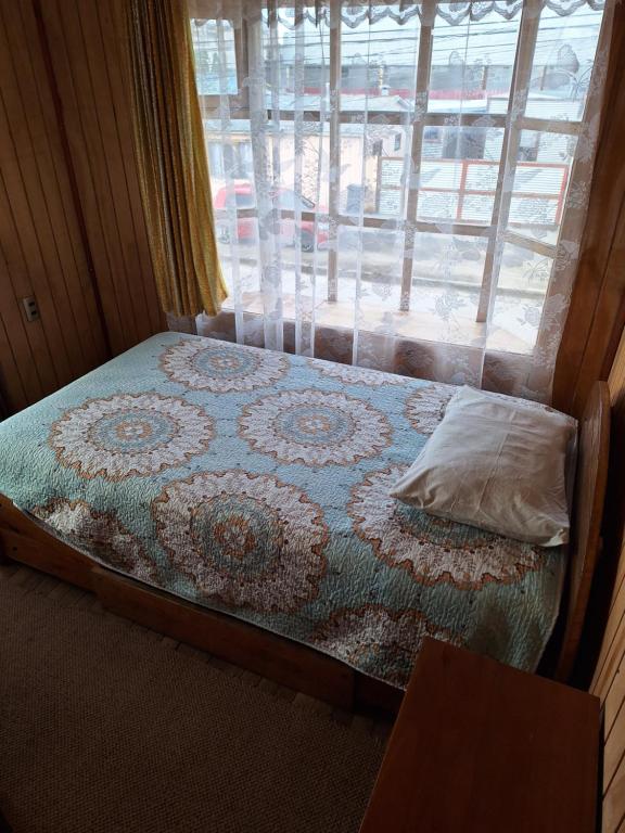 Postel nebo postele na pokoji v ubytování Natales trip