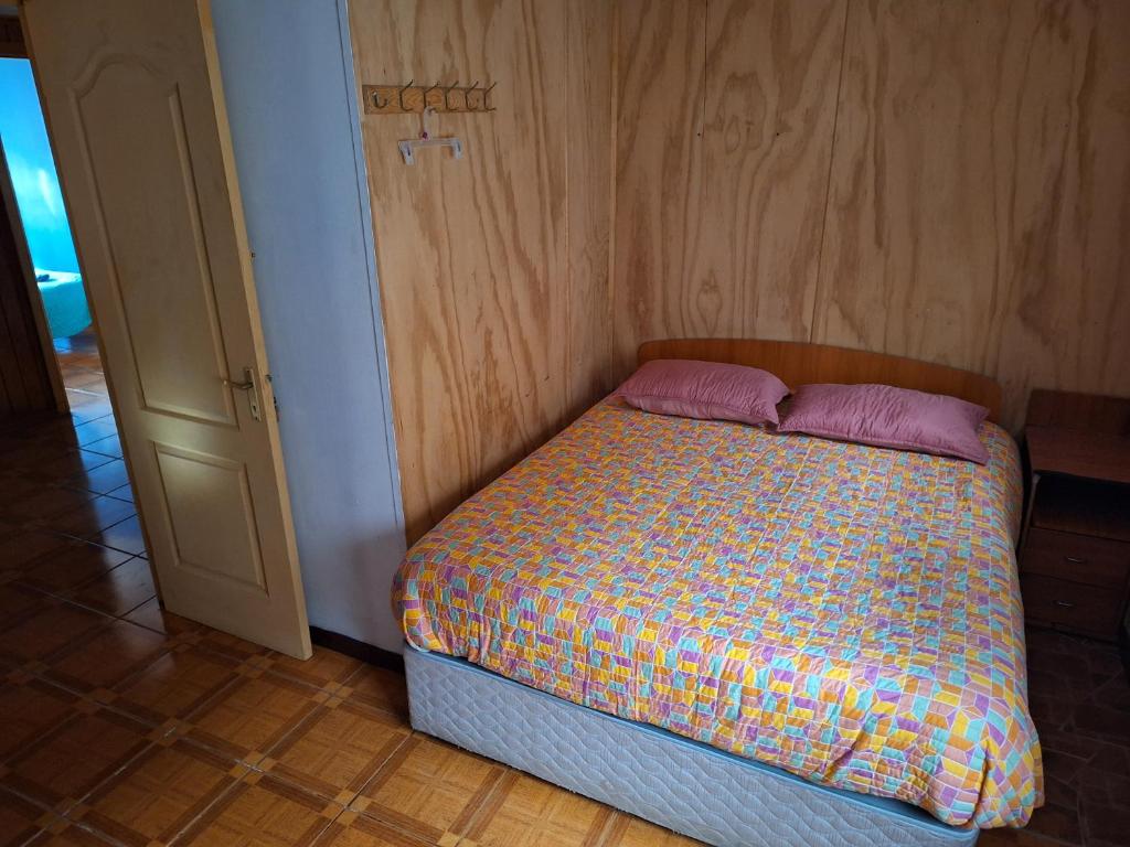 Postel nebo postele na pokoji v ubytování Natales trip