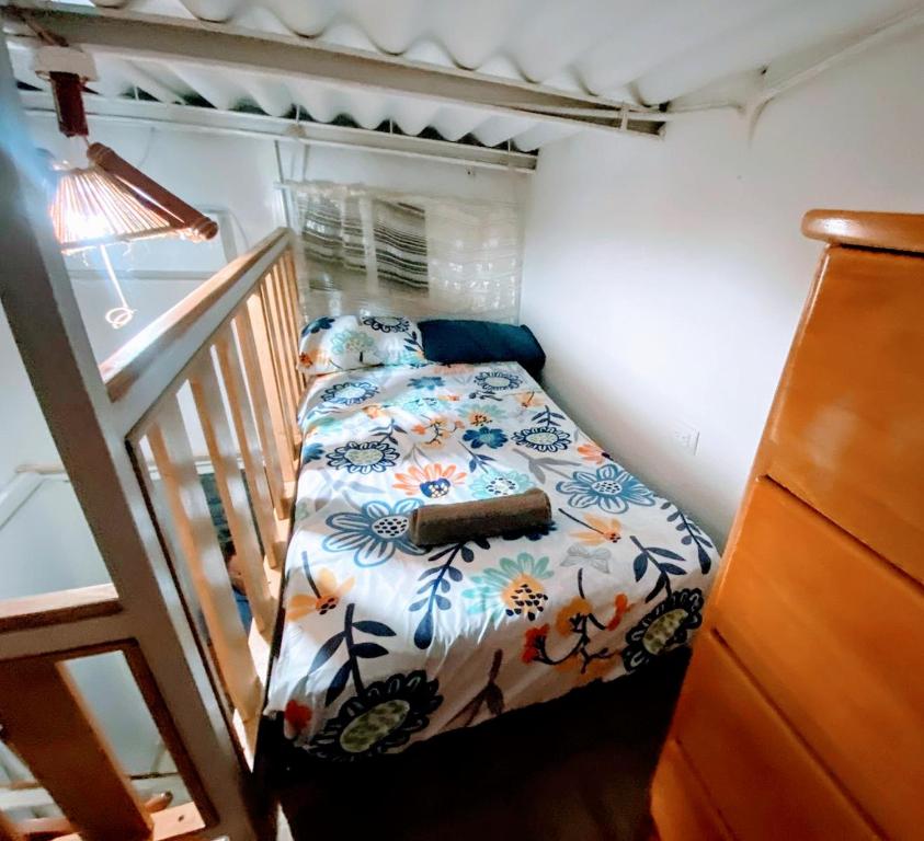 Postel nebo postele na pokoji v ubytování Dulcinea Mini House