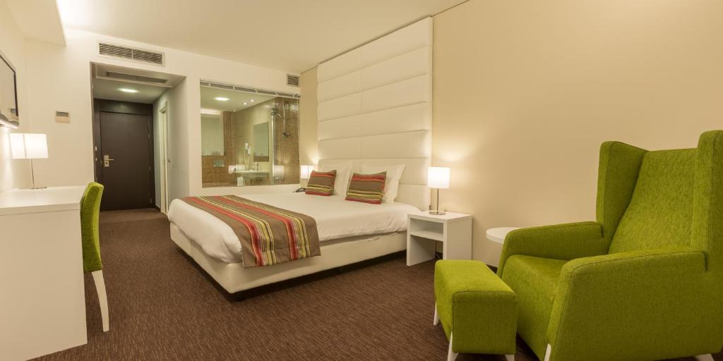 Postel nebo postele na pokoji v ubytování Steyler Fatima Hotel & Congress