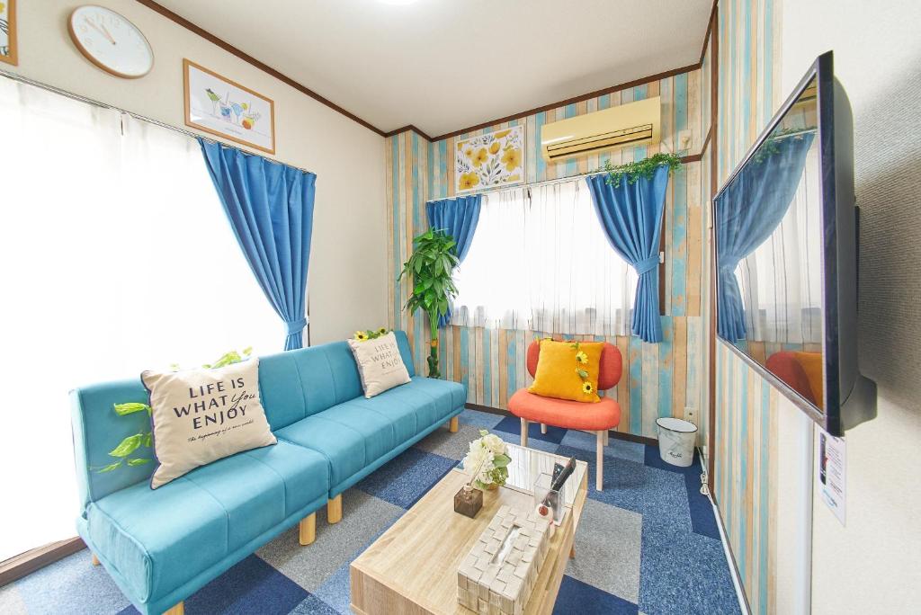Una televisión o centro de entretenimiento en Belmont 101 3min to Station Easy Access Ueno Asakusa Skytree Sleeps 5