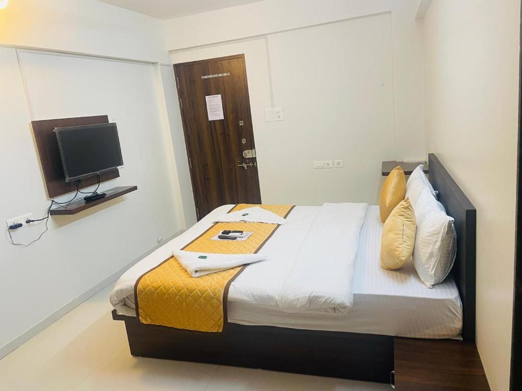 Postel nebo postele na pokoji v ubytování Habitat Inn