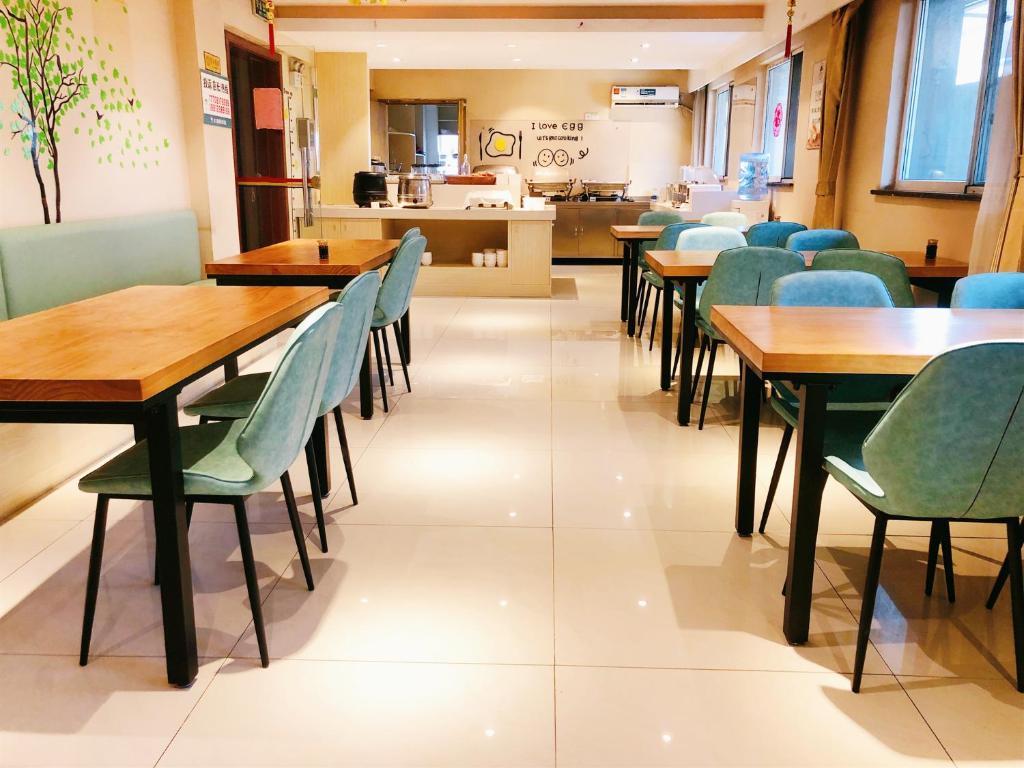 Restaurace v ubytování 无锡东方枫韵商务酒店惠山万达店