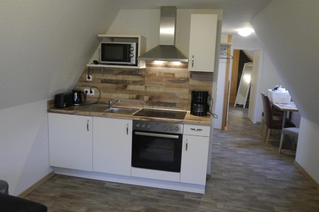 Kuchyň nebo kuchyňský kout v ubytování Hotel Haus Wittwer