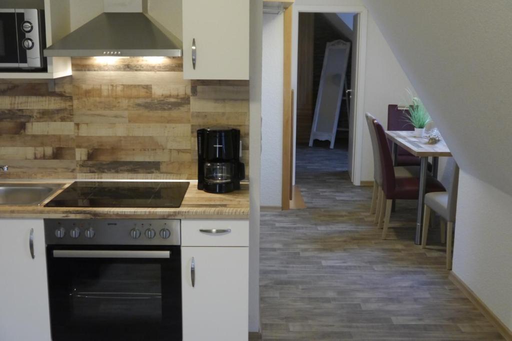 Kuchyň nebo kuchyňský kout v ubytování Hotel Haus Wittwer