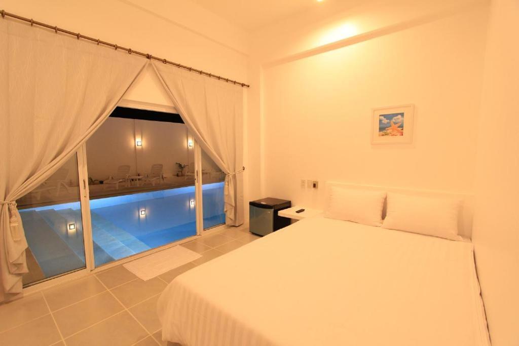 Bazén v ubytování Coron Bluewave Hotel nebo v jeho okolí
