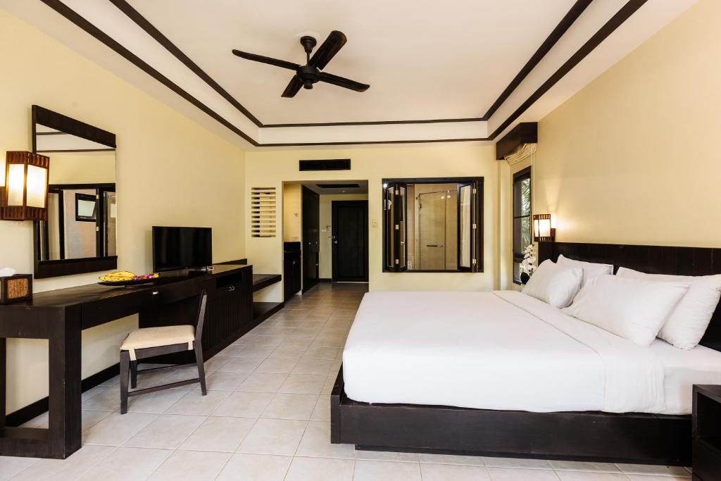 Postel nebo postele na pokoji v ubytování Nang Thong Beach Resort