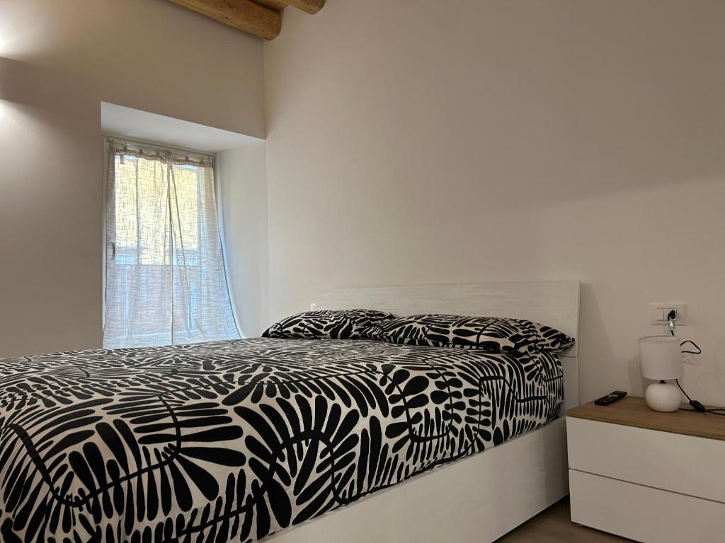 Rúm í herbergi á Fanzago Trilo Home
