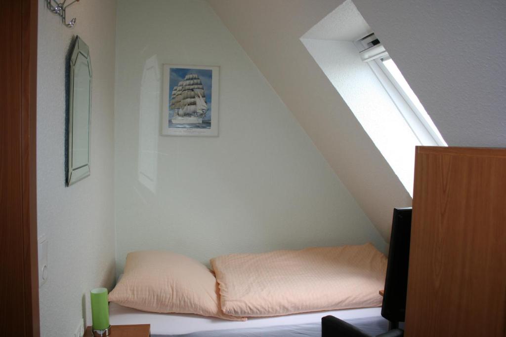 Postel nebo postele na pokoji v ubytování Hotel Haus Wittwer