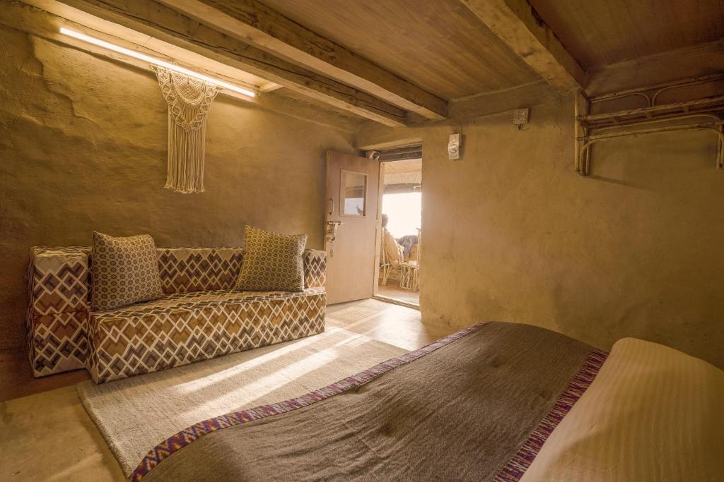 Postel nebo postele na pokoji v ubytování GlampEco Manali