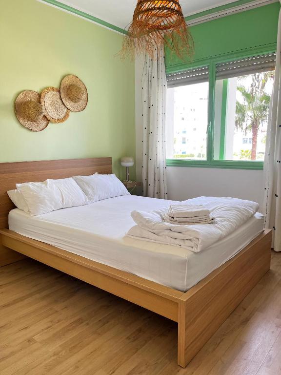 Postel nebo postele na pokoji v ubytování Luxueux appartement avec vue mer & piscine