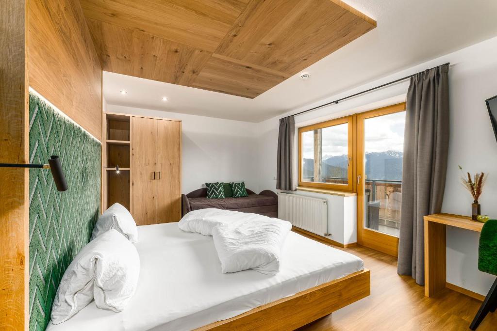 Postel nebo postele na pokoji v ubytování Hotel Pfeiferhof