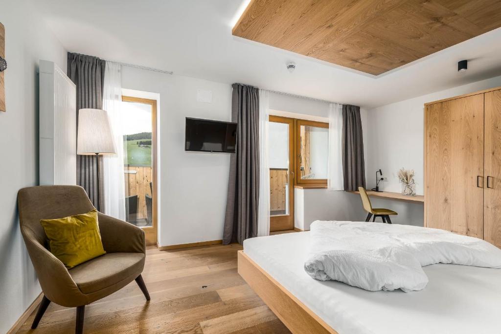 Postel nebo postele na pokoji v ubytování Hotel Pfeiferhof