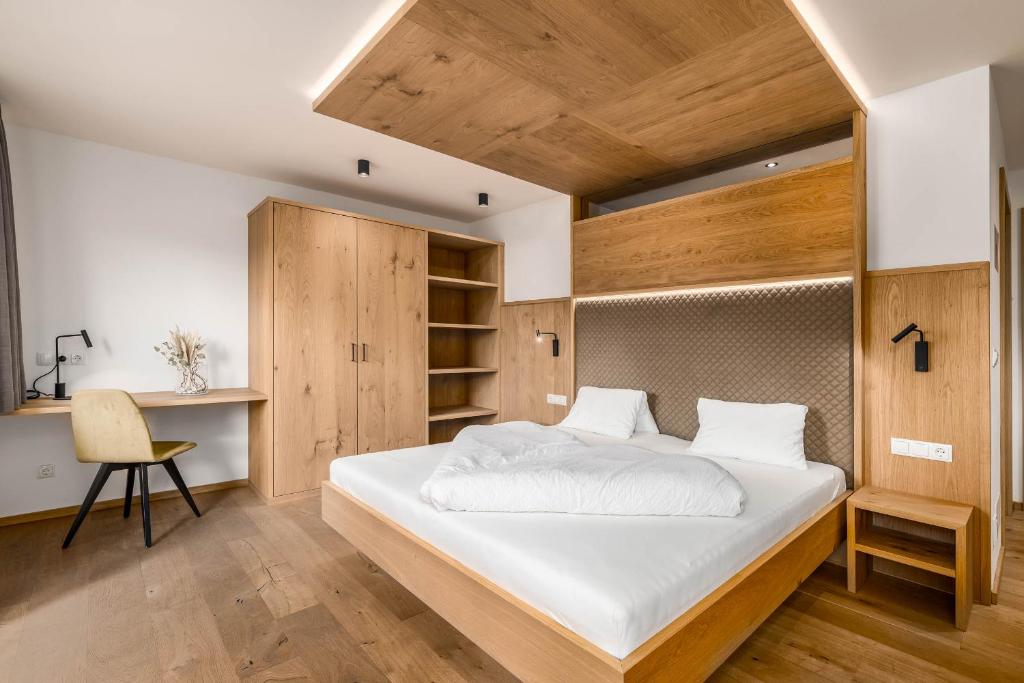 Postel nebo postele na pokoji v ubytování Hotel Pfeiferhof