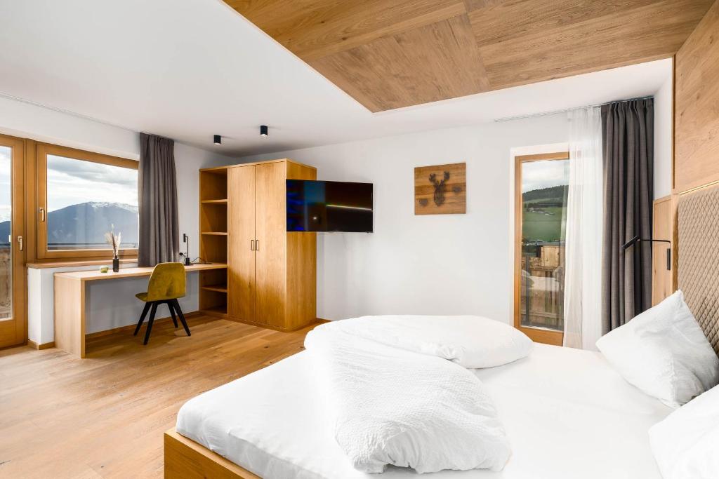 Postel nebo postele na pokoji v ubytování Hotel Pfeiferhof