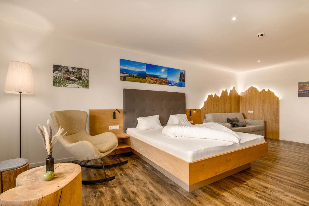 Postel nebo postele na pokoji v ubytování Hotel Pfeiferhof