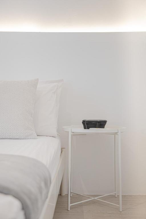 Postel nebo postele na pokoji v ubytování HAO Hotel Phuket
