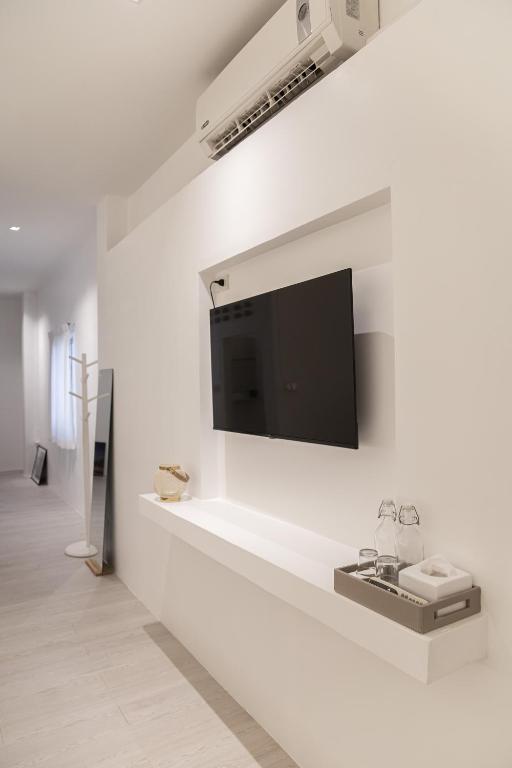 TV a/nebo společenská místnost v ubytování HAO Hotel Phuket
