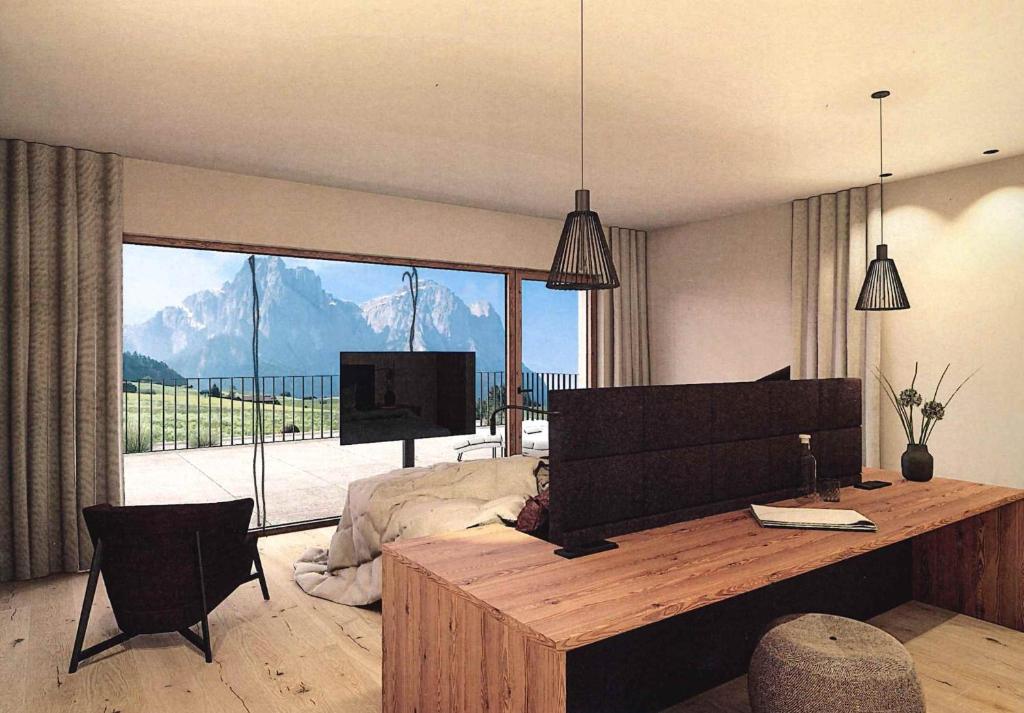 TV a/nebo společenská místnost v ubytování Parc Hotel Tyrol