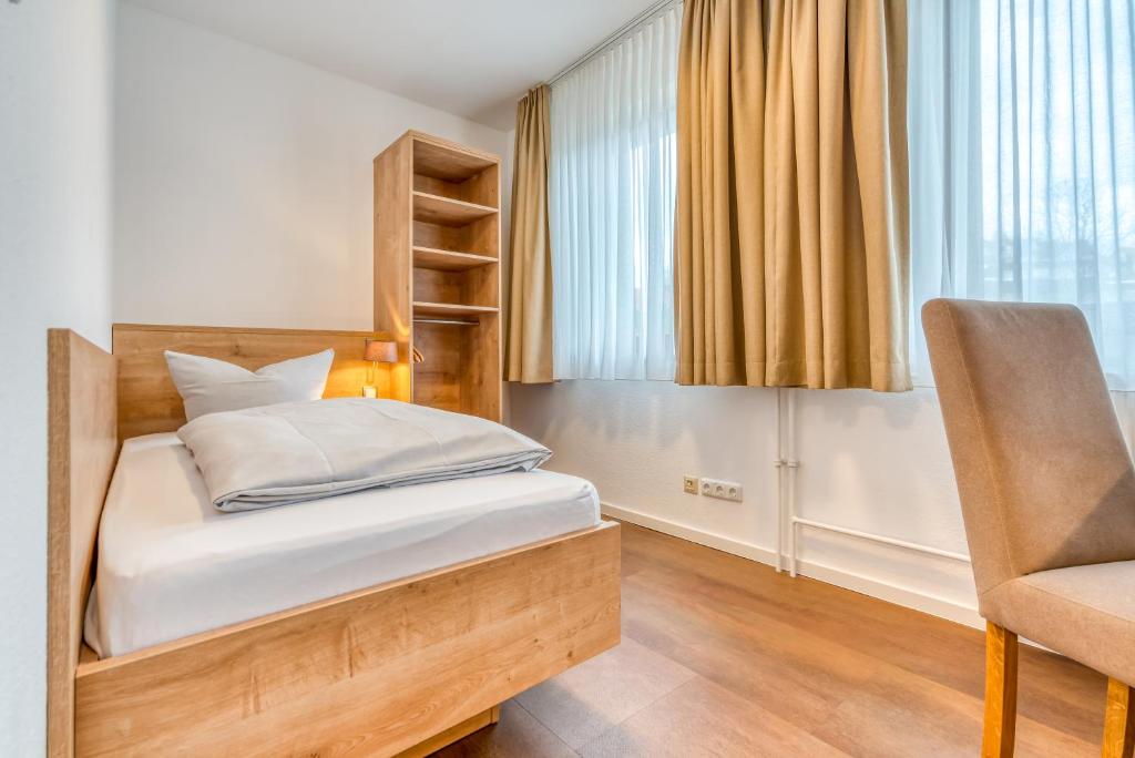 Postel nebo postele na pokoji v ubytování Guesthouse Beckmann