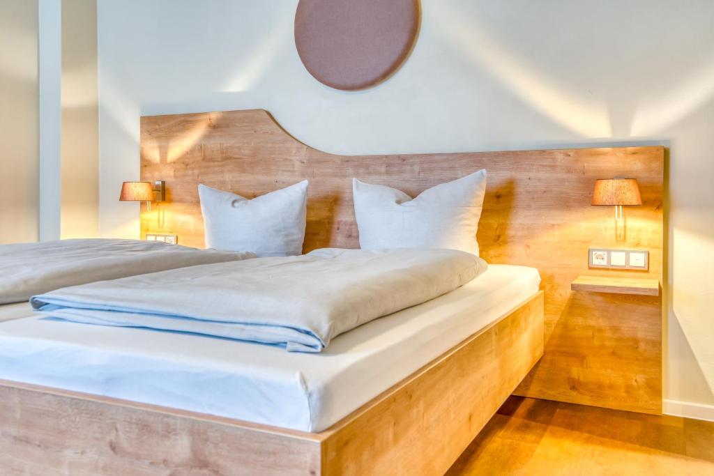 Postel nebo postele na pokoji v ubytování Guesthouse Beckmann
