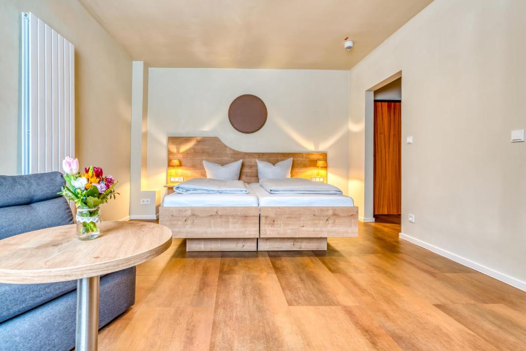 Postel nebo postele na pokoji v ubytování Guesthouse Beckmann